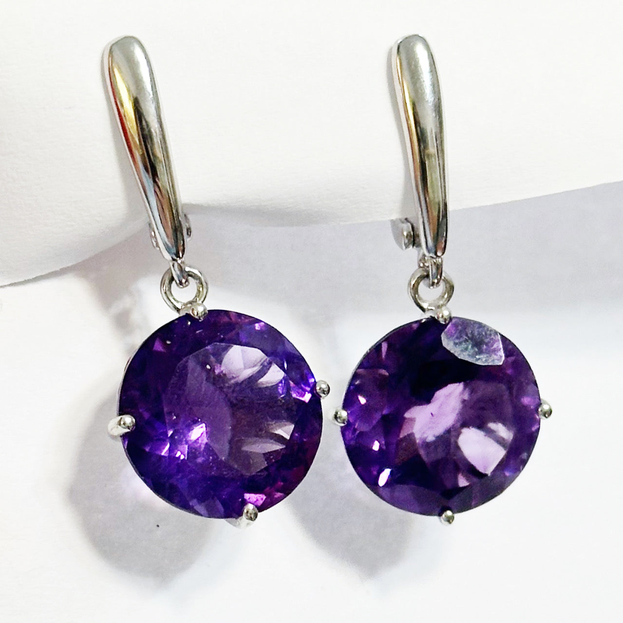 Sterling silver rhodium plated earrings with amethysts
