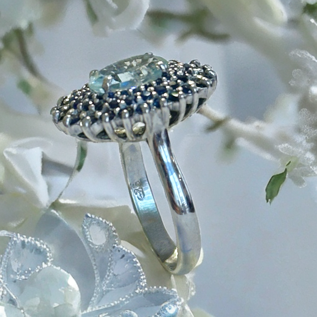 Sterling silver ring with aquamarine and blue sapphires