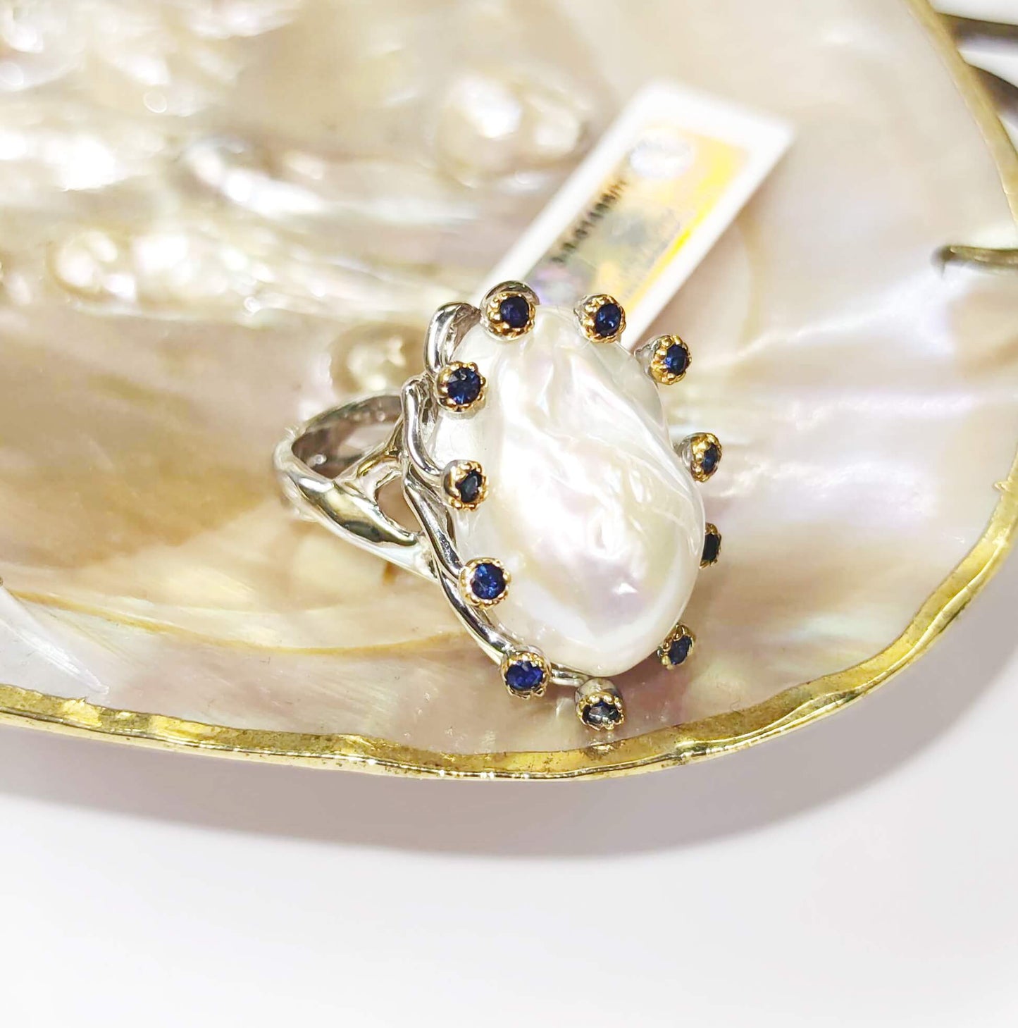 Silver Ring with White Baroque Pearl and Blue Sapphires