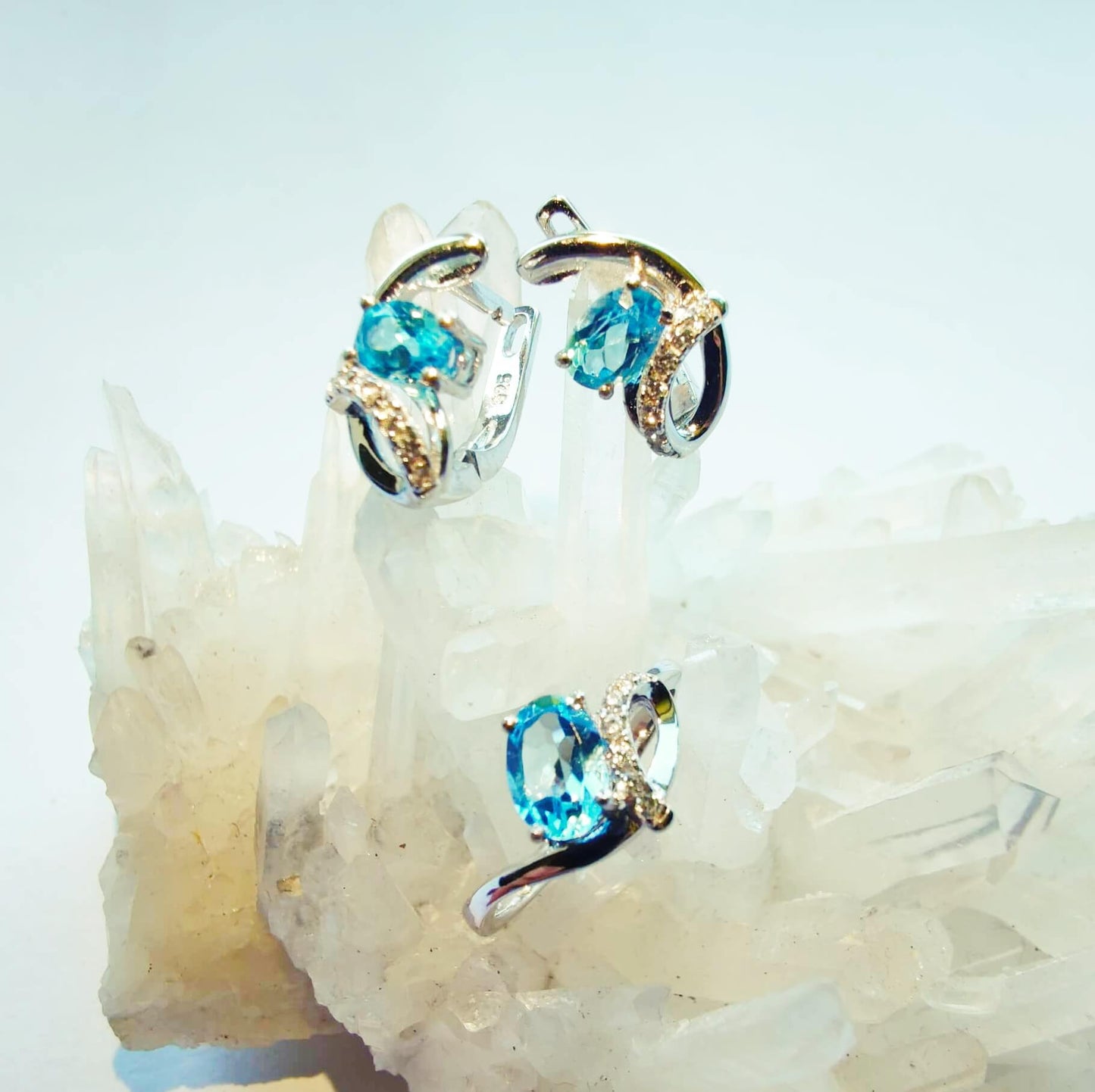 Silver Ring with Swiss Blue Topaz and Zircons