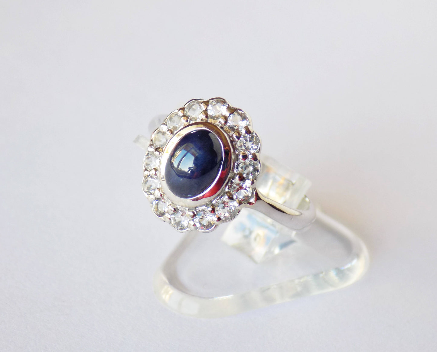 Silver Ring with Star Blue Sapphire and White Topazes
