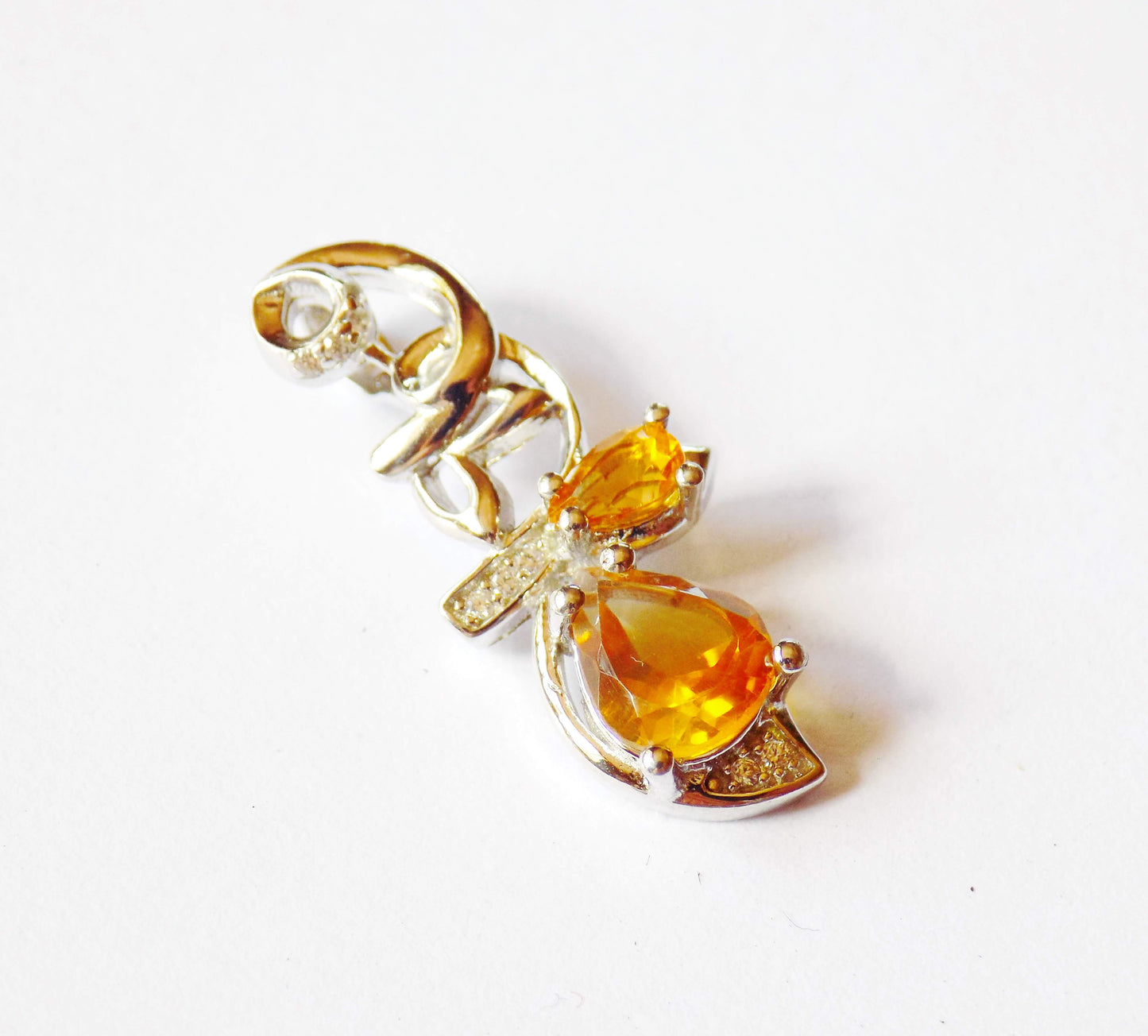 Серебряное кольцо с цитринами и цирконами