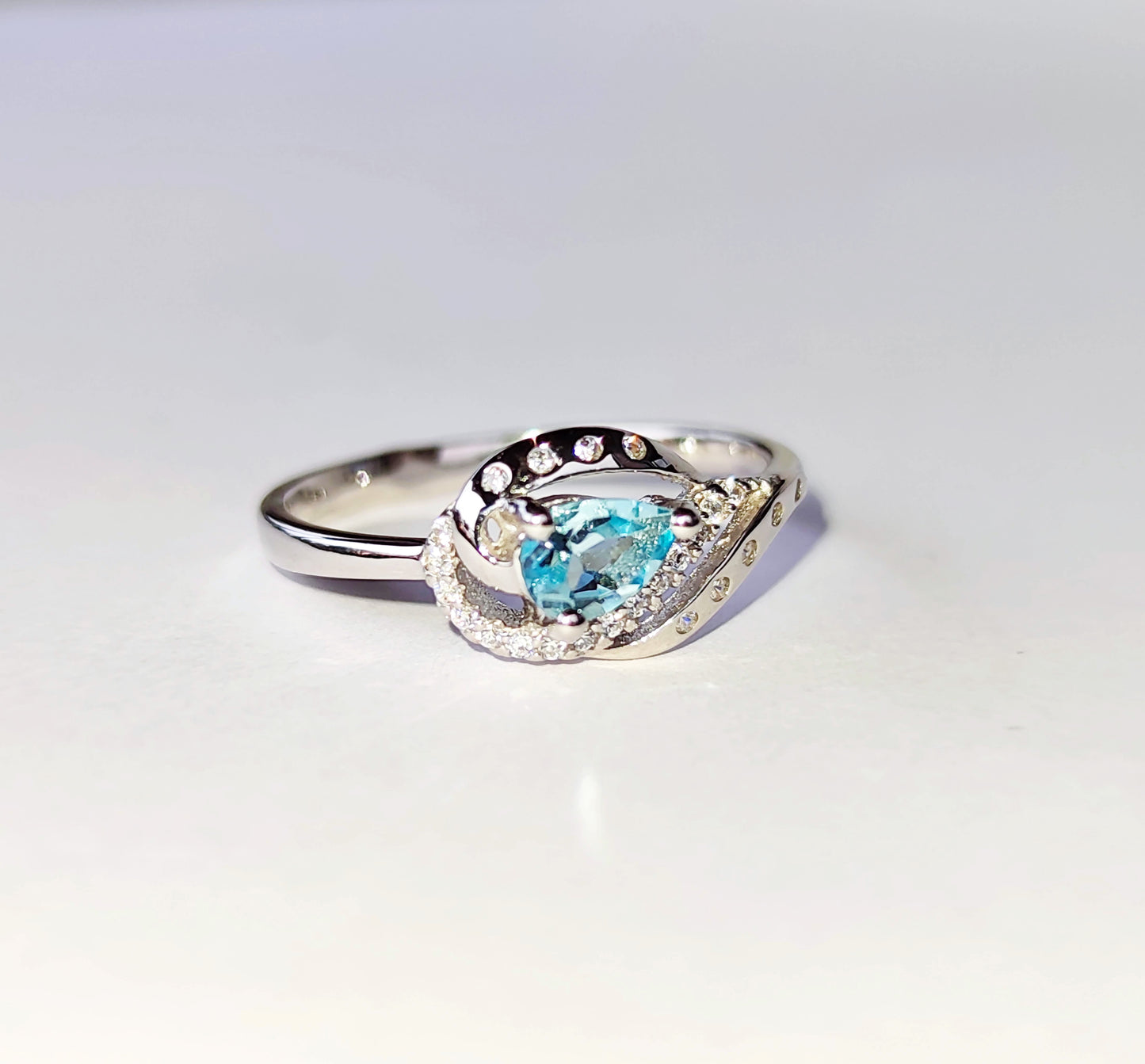 Silver Pendant with Blue Topaz and Zircons