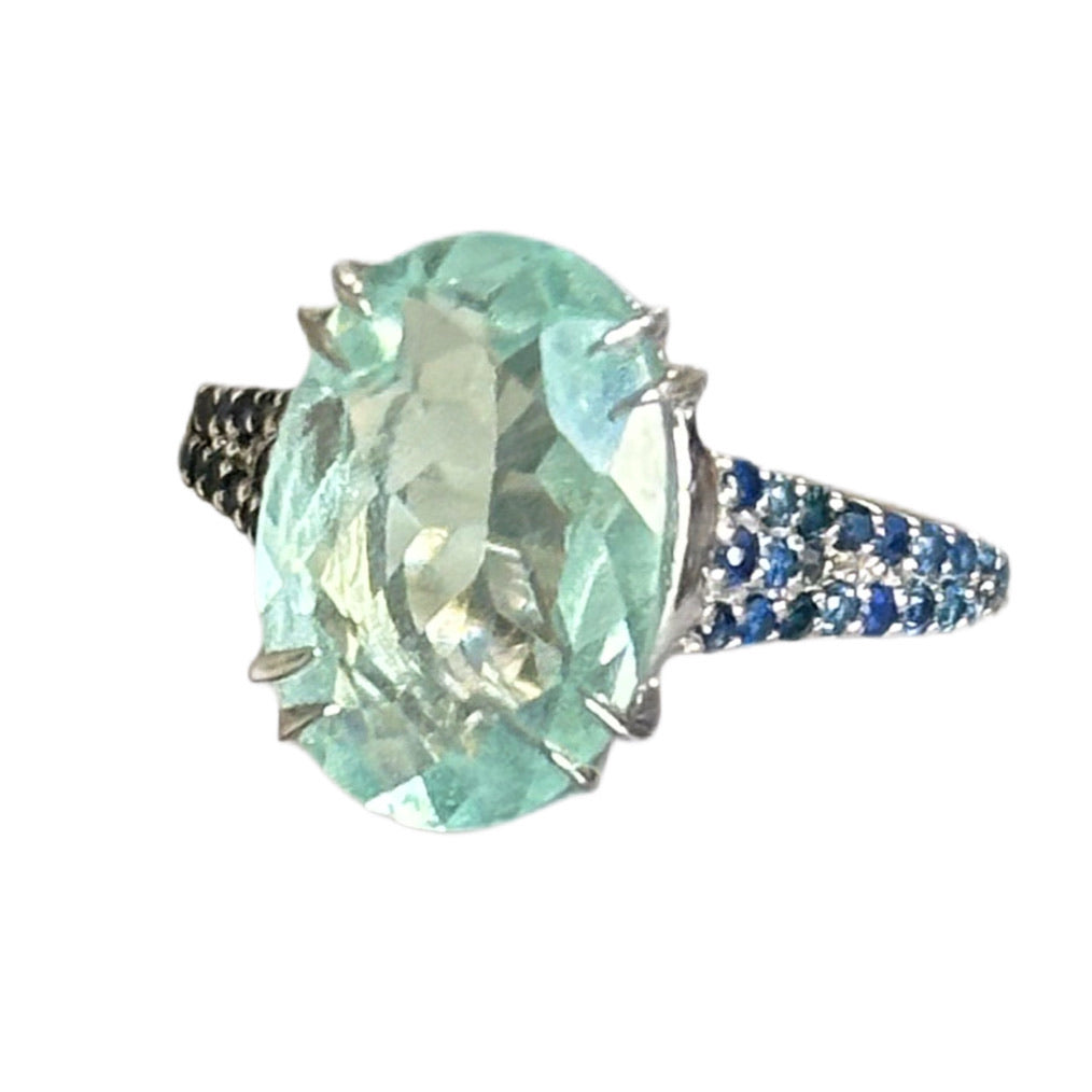 white rhodium plated Sterling silver ring with aquamarine and blue sapphires