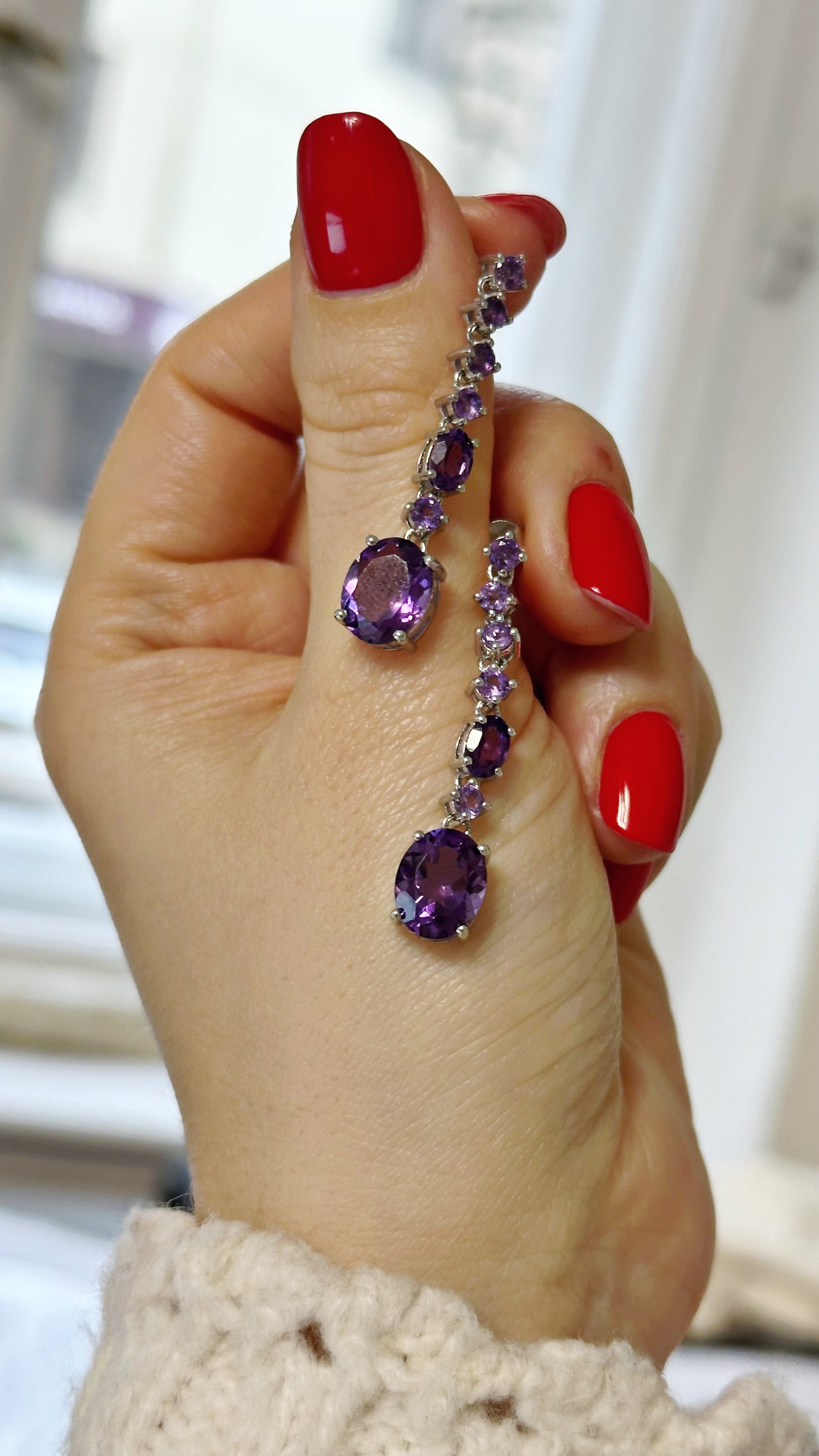 Sterling silver dangle earrings with amethysts