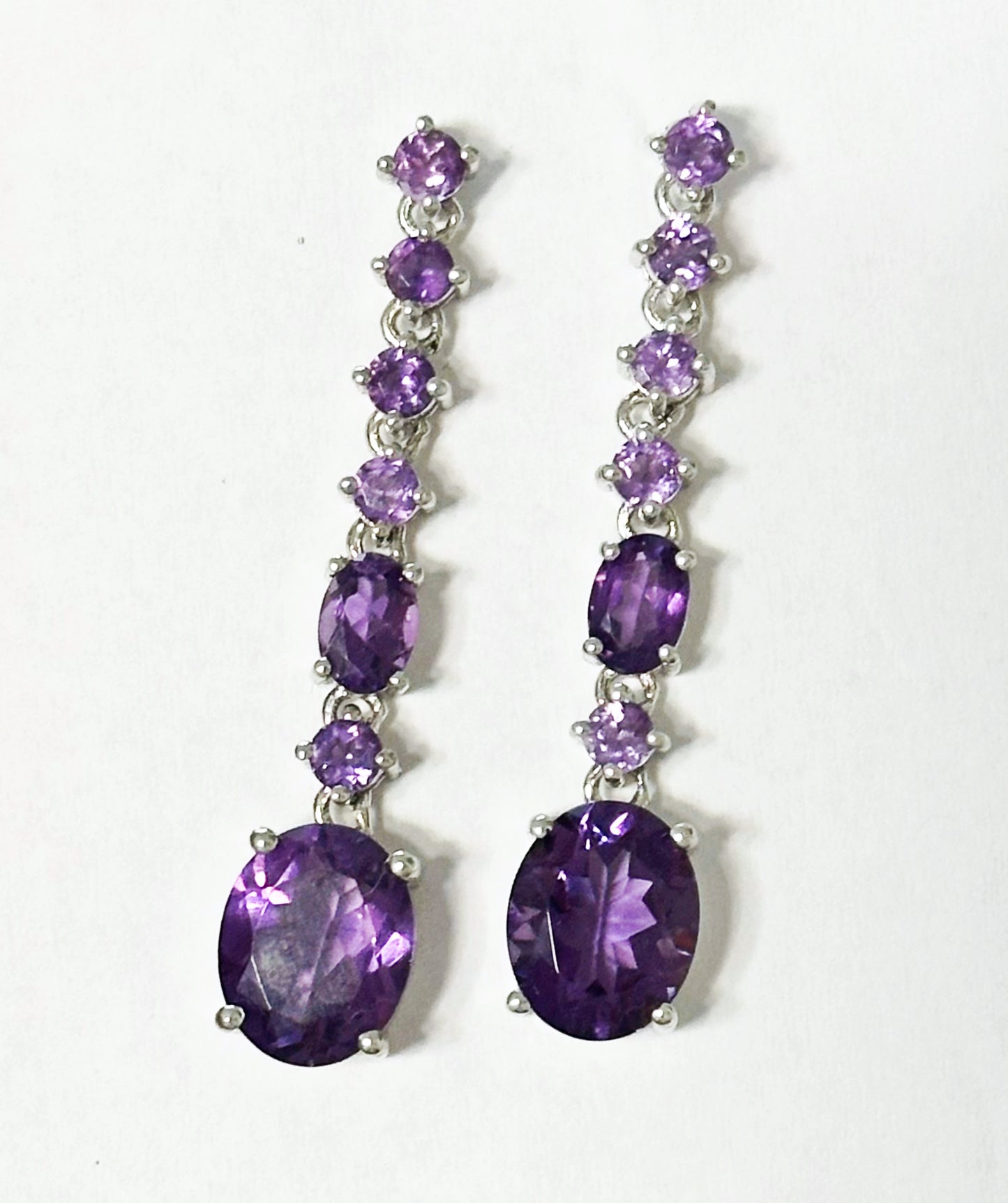 Sterling silver dangle earrings with amethysts