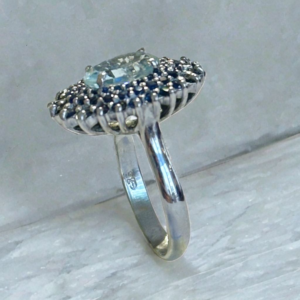 Sterling silver ring with aquamarine and blue sapphires