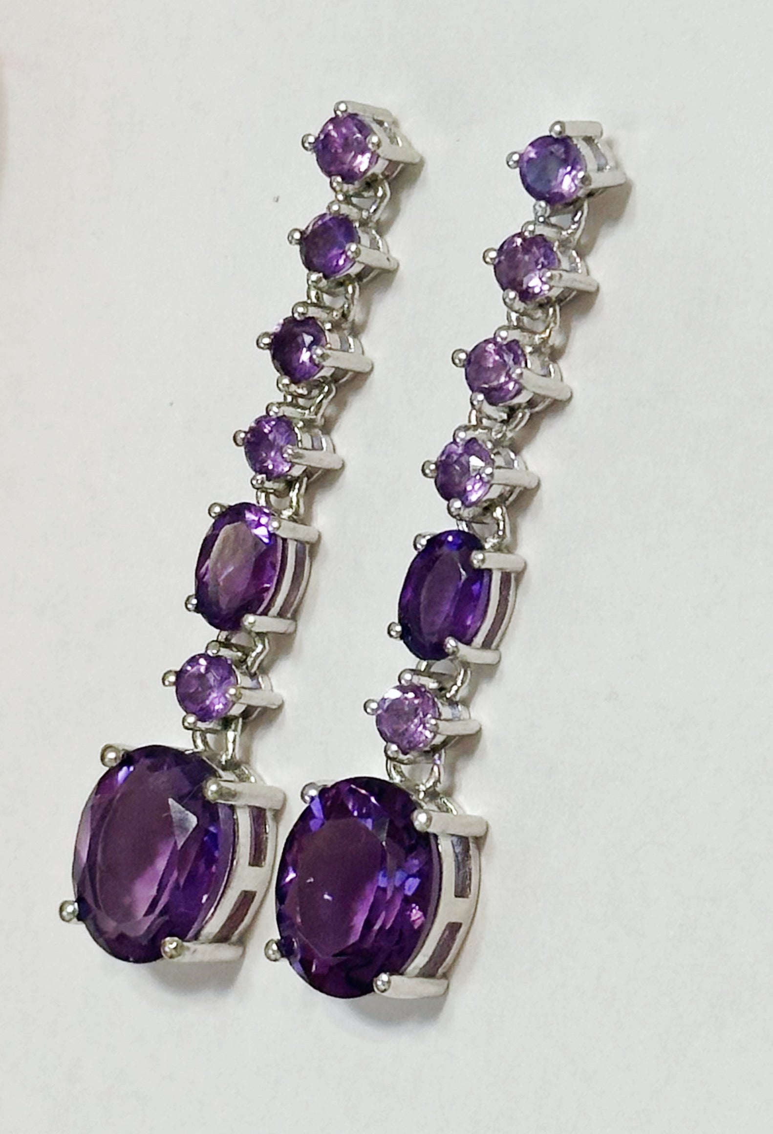 Sterling silver dangle earrings with amethysts