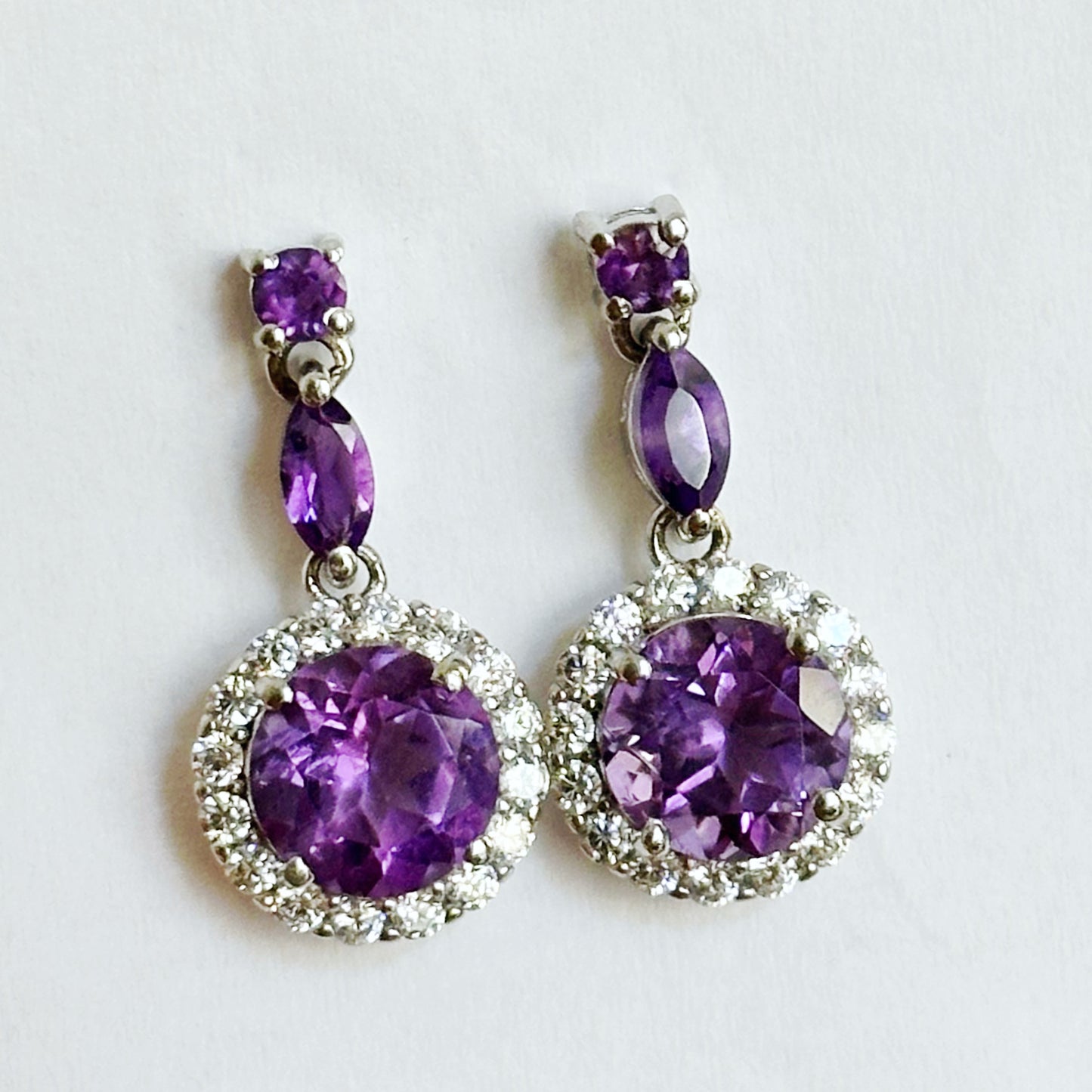 Dainty sterling silver stud earrings with amethysts and zircons