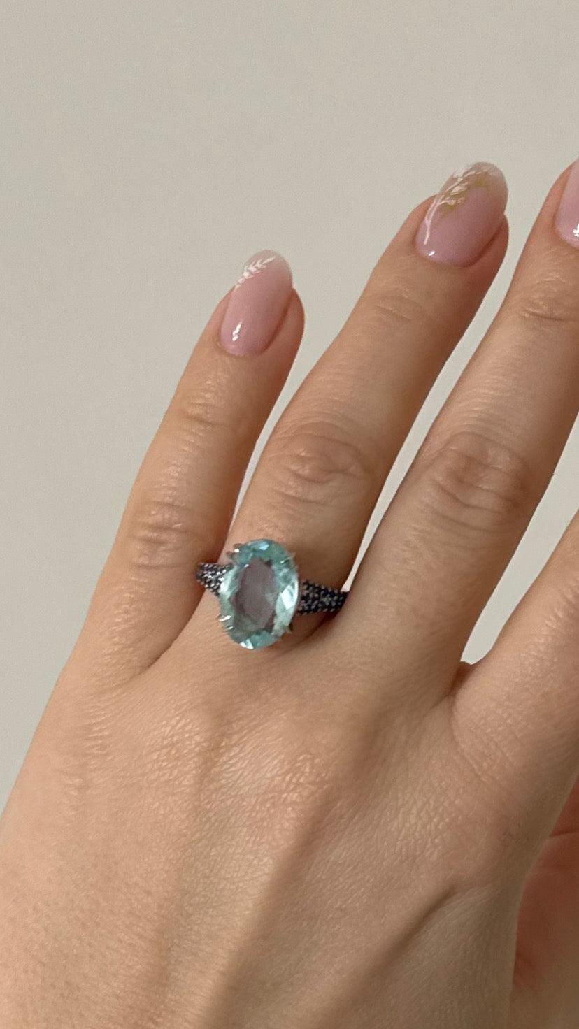 white rhodium plated Sterling silver ring with aquamarine and blue sapphires