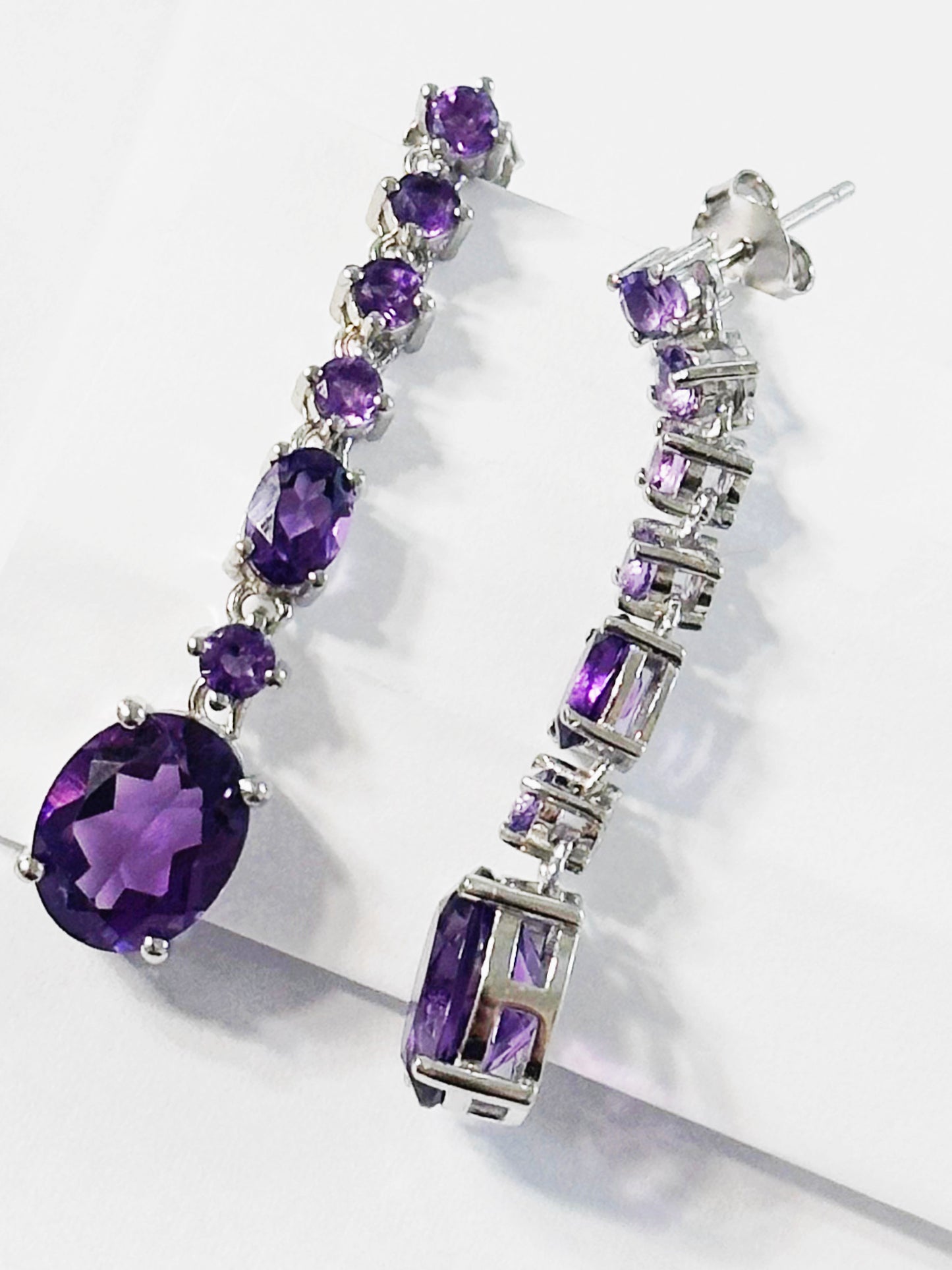 Sterling silver dangle earrings with amethysts