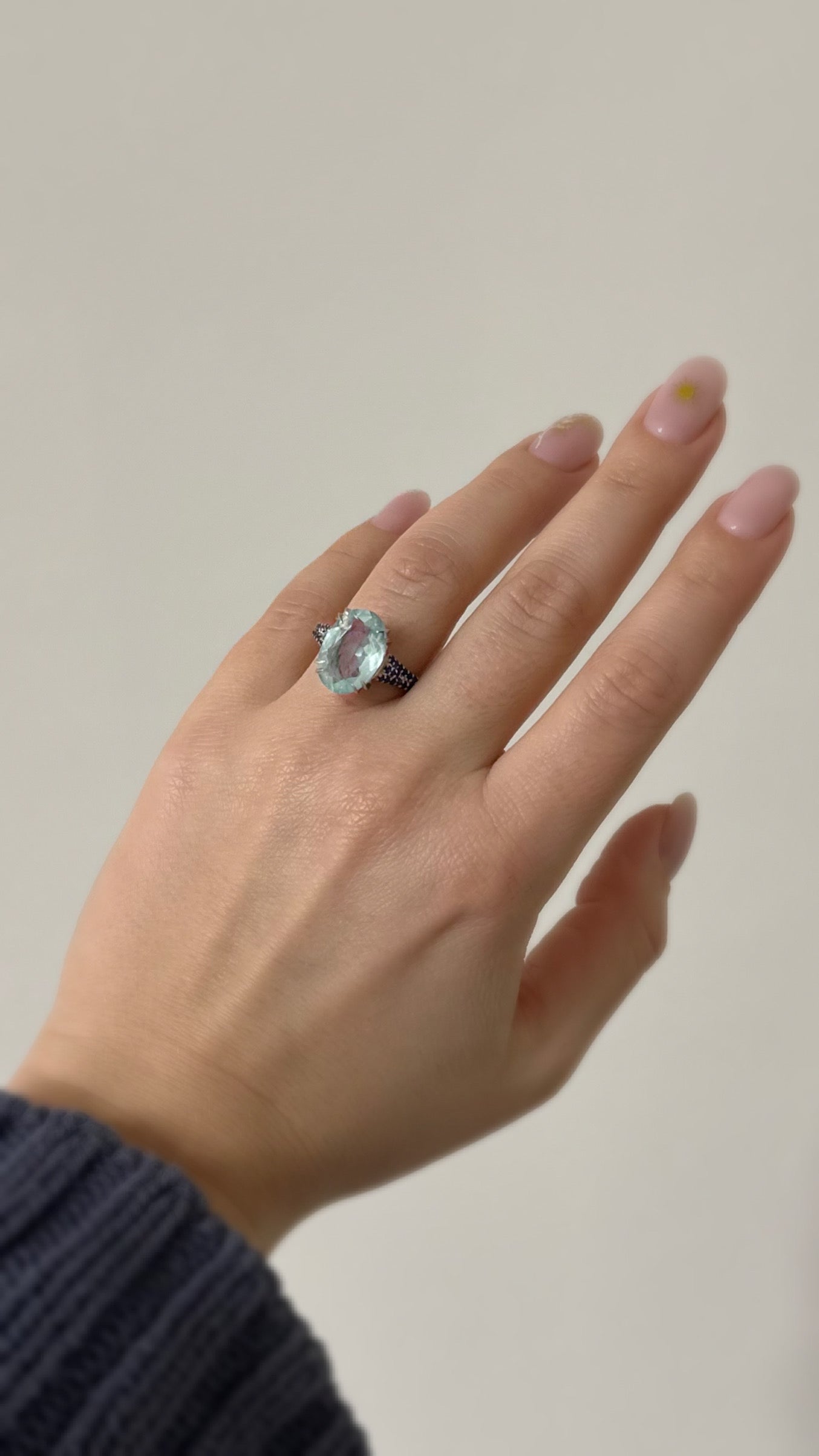 white rhodium plated Sterling silver ring with aquamarine and blue sapphires
