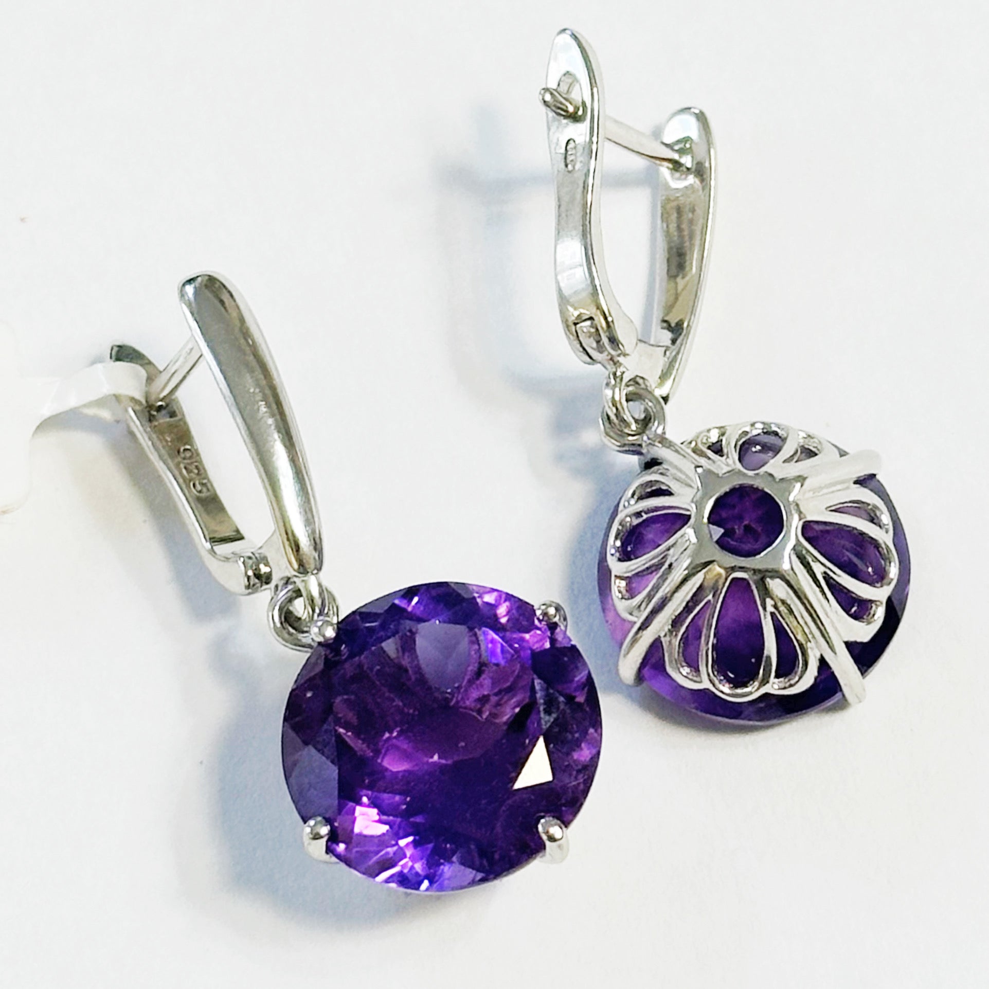 Sterling silver rhodium plated earrings with amethysts