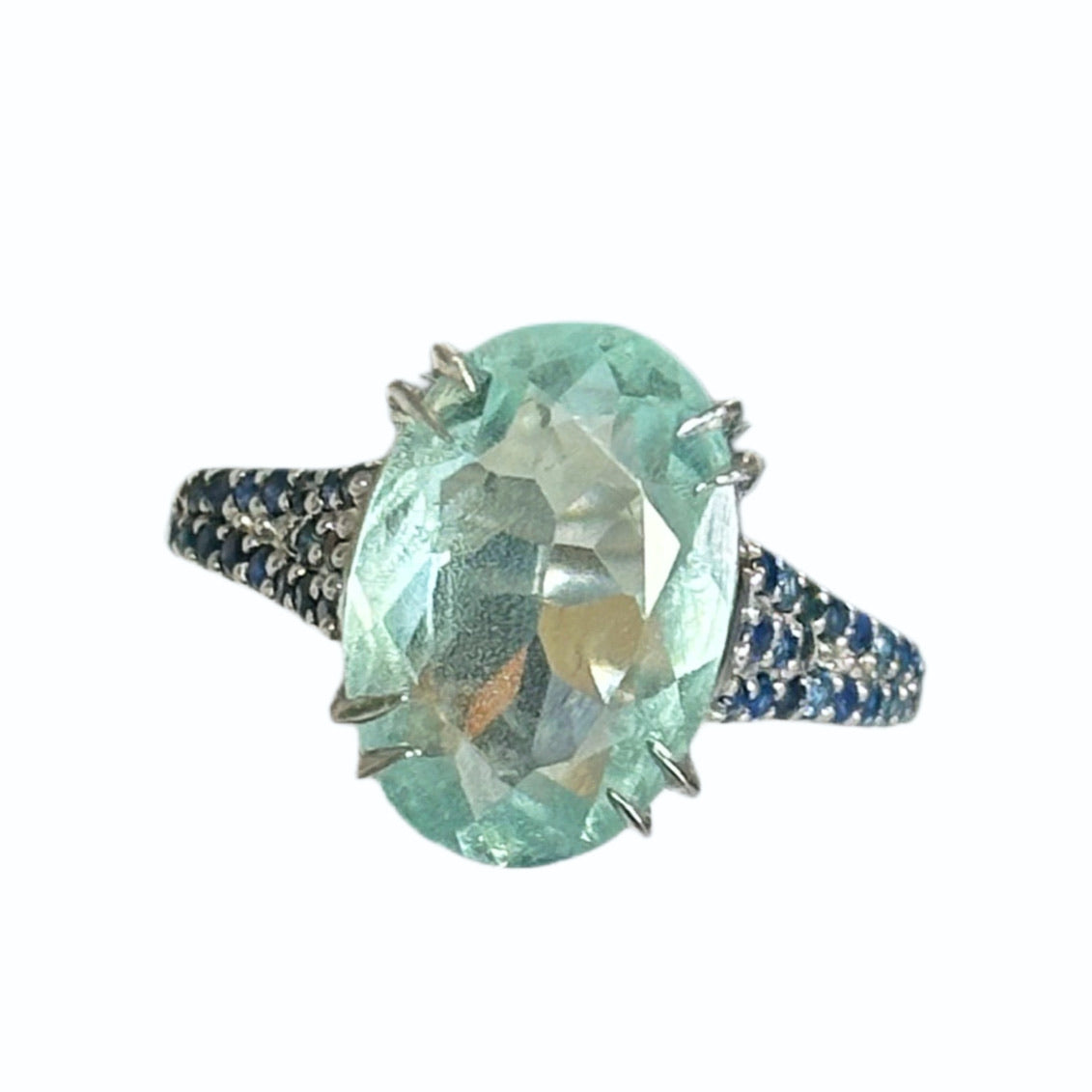 white rhodium plated Sterling silver ring with aquamarine and blue sapphires