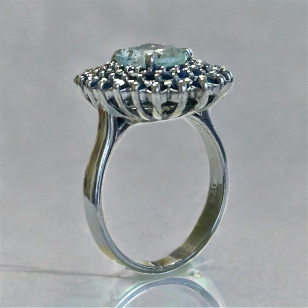 Sterling silver ring with aquamarine and blue sapphires