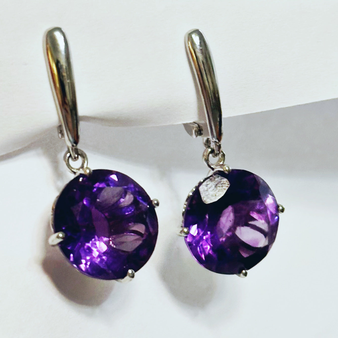 Sterling silver rhodium plated earrings with amethysts