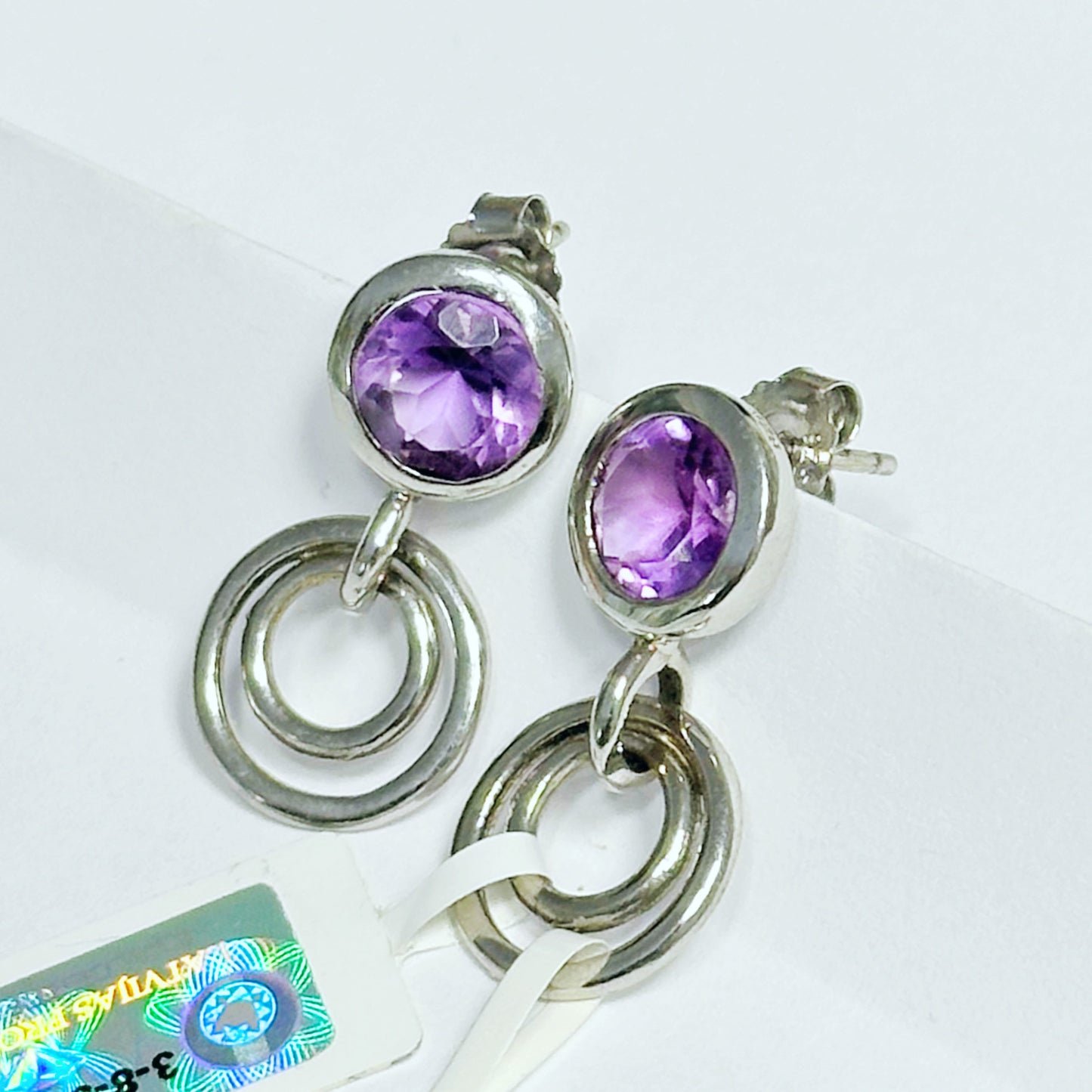 Geometric sterling silver stud earrings with amethysts
