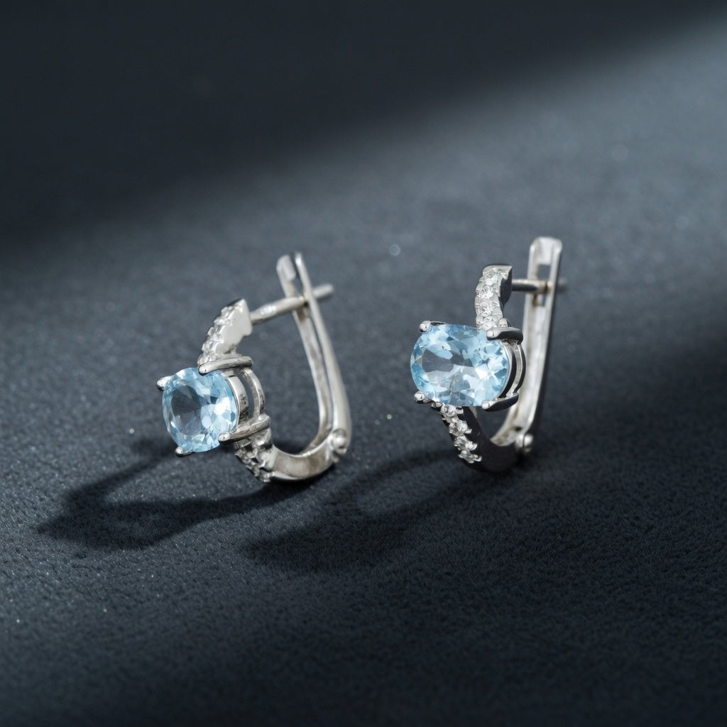 Silver Earrings with Sky Blue Topazes and Zircons