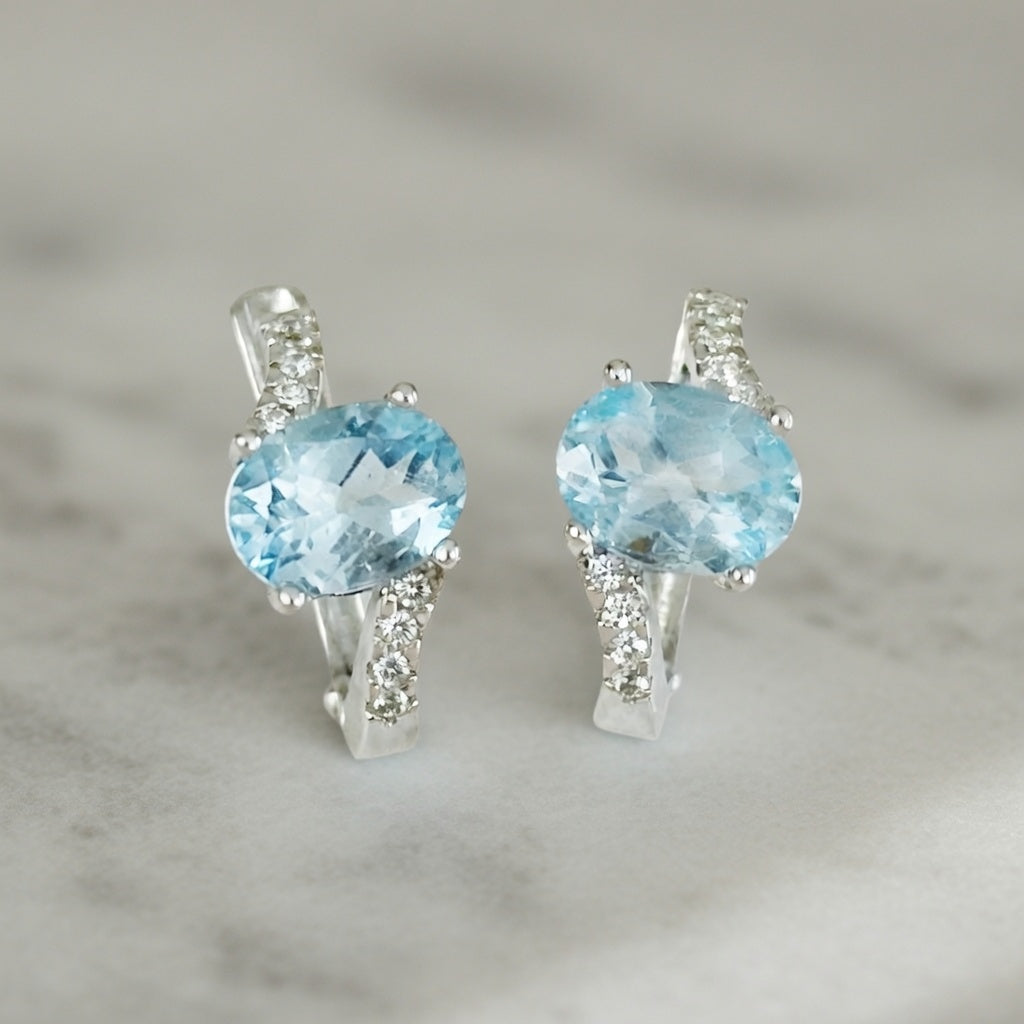 Silver Earrings with Sky Blue Topazes and Zircons